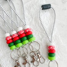 Load image into Gallery viewer, Lill’ Wristie in Holiday Color Palette