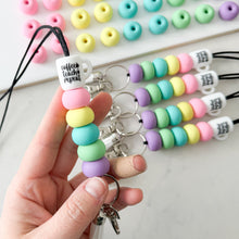 Load image into Gallery viewer, Coffee Teach Repeat Rainbow Lanyard