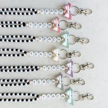 Load image into Gallery viewer, Black and White Pastel Bow TEACH Friendship Bracelet Full Beaded Lanyard