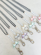 Load image into Gallery viewer, Black and White Pastel Bow TEACH Friendship Bracelet Full Beaded Lanyard