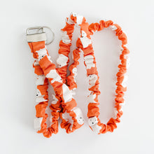 Load image into Gallery viewer, Orange Ghost Gathering Scrunchie Lanyard